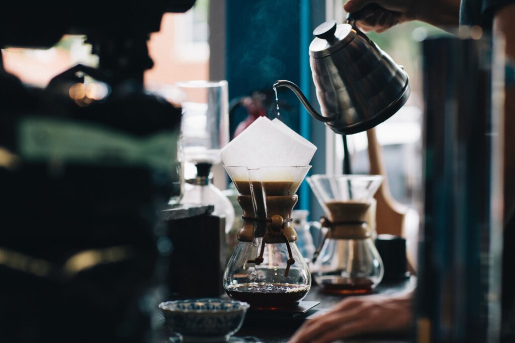 Pouring coffee.